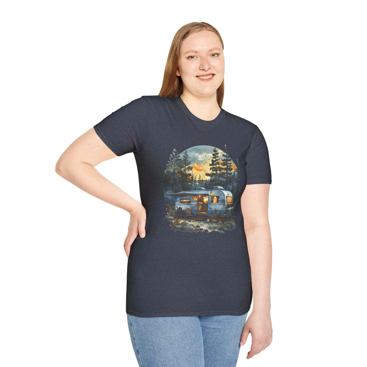 Cozy Camper Unisex softstyle t-shirt with outdoor camper trailer design, worn by smiling woman in casual jeans