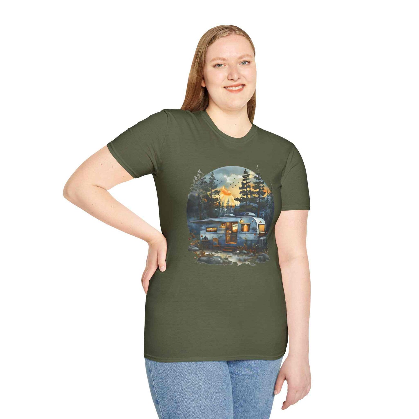 Cozy Camper Unisex softstyle t-shirt with camping trailer and forest graphic, worn by smiling woman