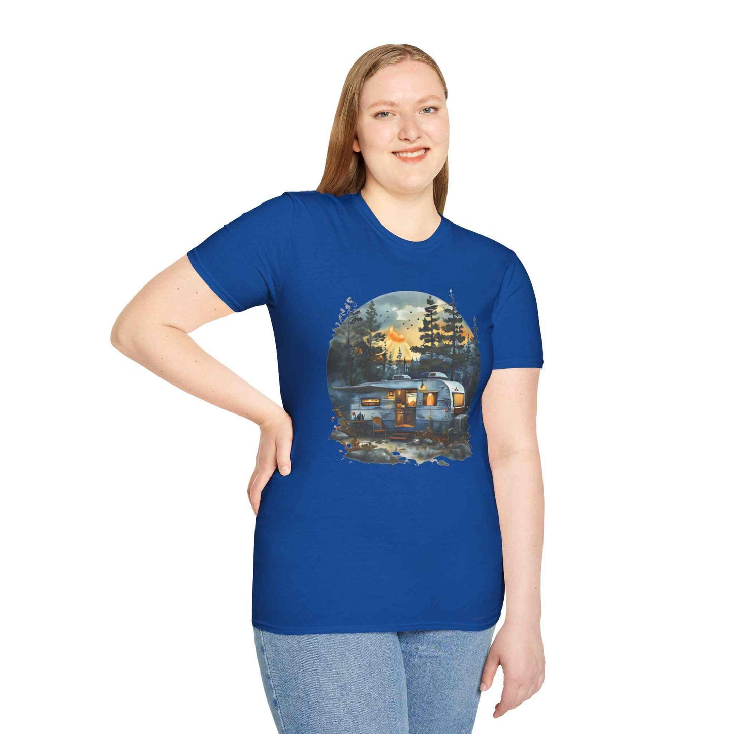 Cozy Camper Unisex blue softstyle t-shirt with camping trailer and forest design worn by smiling woman