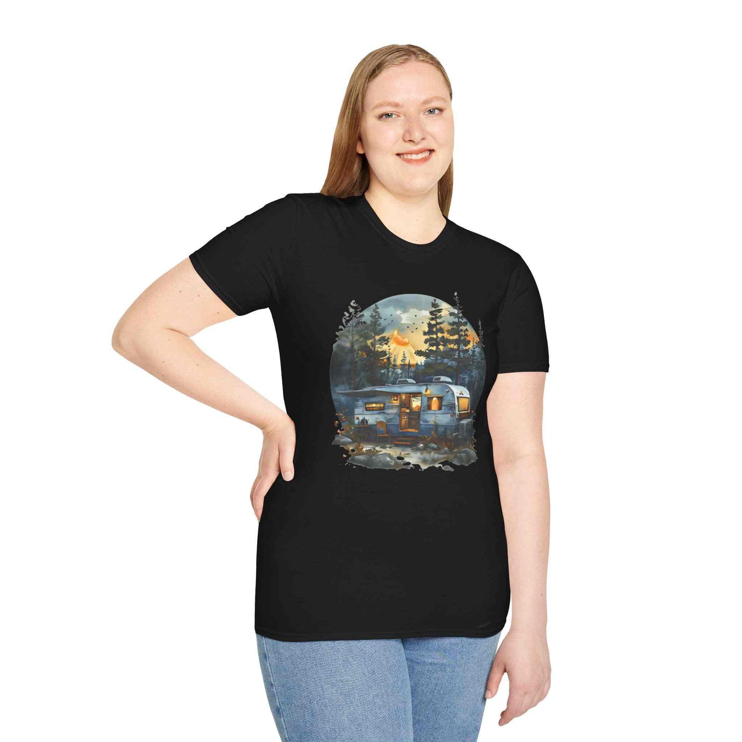 woman wearing black Cozy Camper Unisex Softstyle T-Shirt with camper design outdoors camping theme