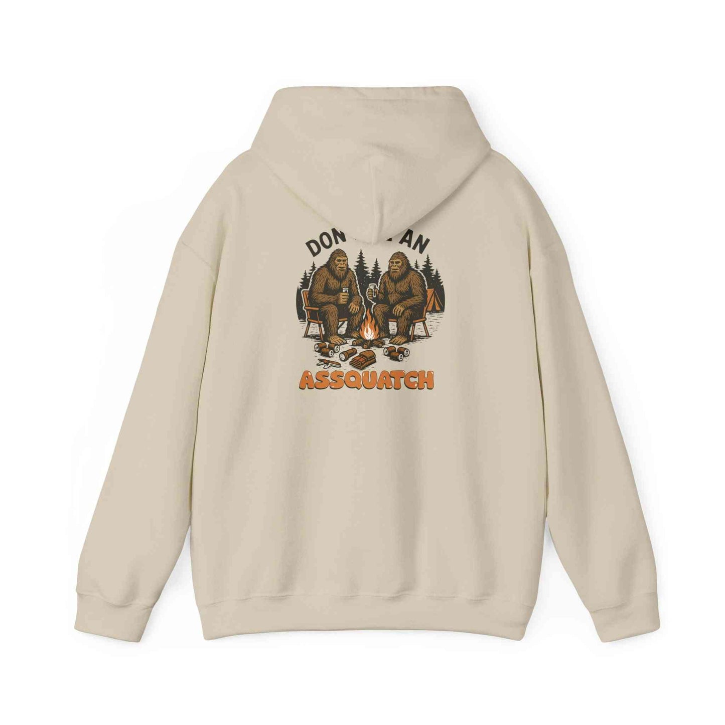 Unisex Cozy Bigfoot Hoodie with Sasquatch campfire design on beige sweatshirt back
