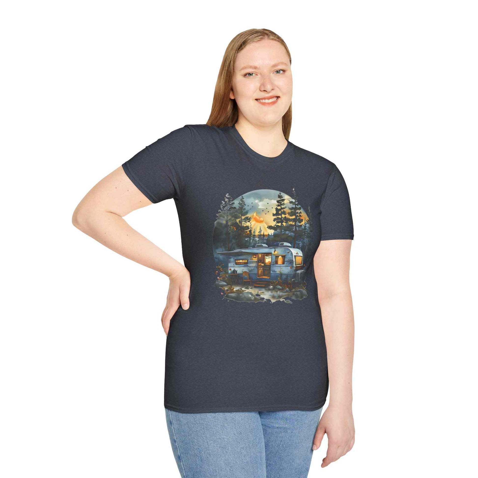 Cozy Camper Unisex softstyle t-shirt with outdoor camper trailer design, worn by smiling woman in casual jeans