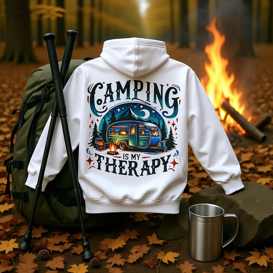 White Camping Therapy Sweatshirt with colorful camping design, outdoor cozy hooded sweatshirt near campfire and hiking gear in autumn forest
